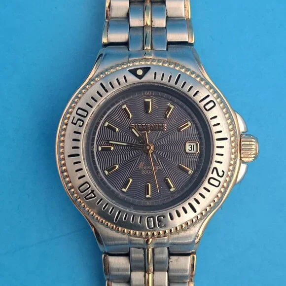 LADIES 2 TONE STAINLESS STEEL WITTNAUER MONTEGO SWISS QUARTZ DATE WATCH, BLUE